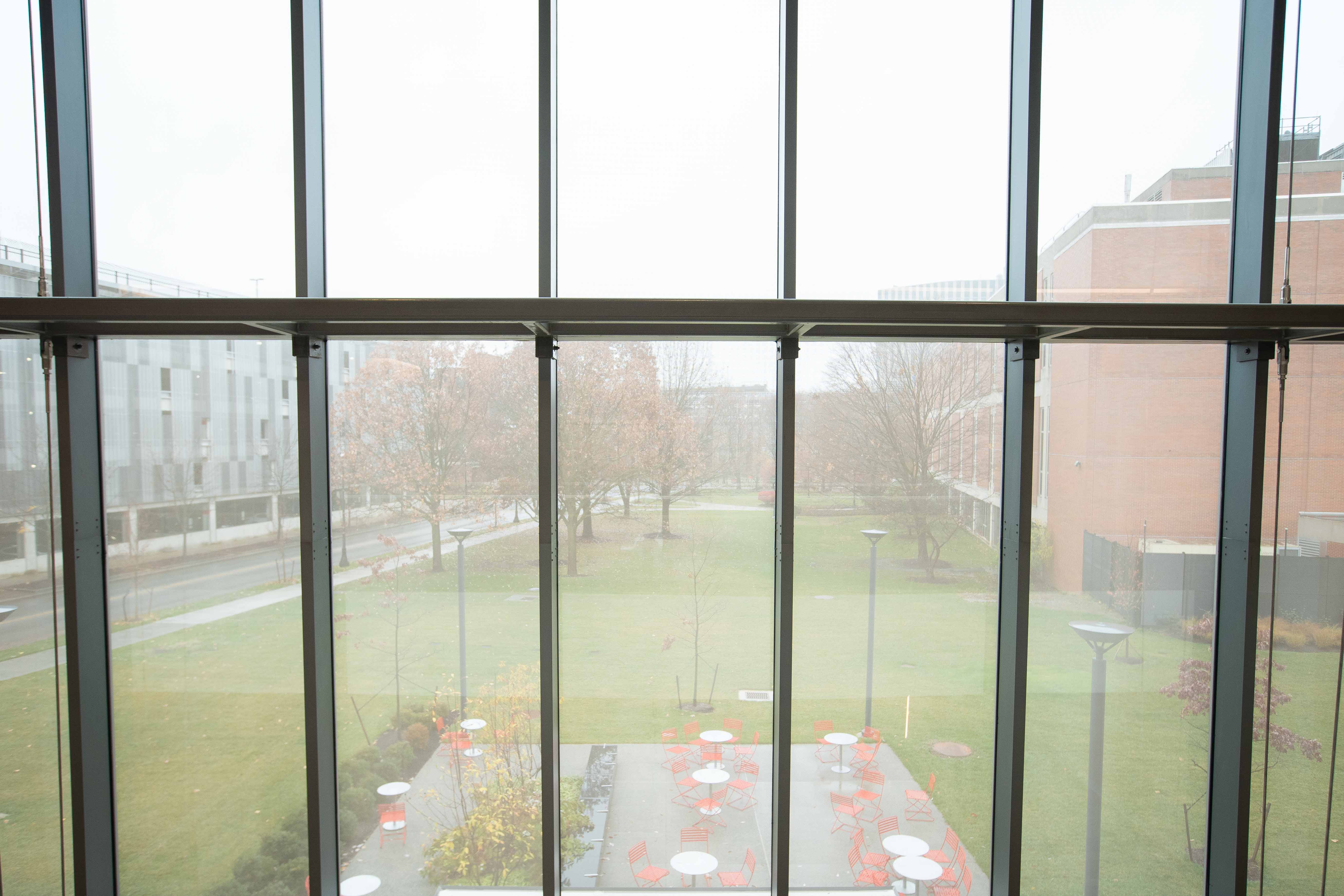 windows in Heminger Hall looking out over the patio seating outside