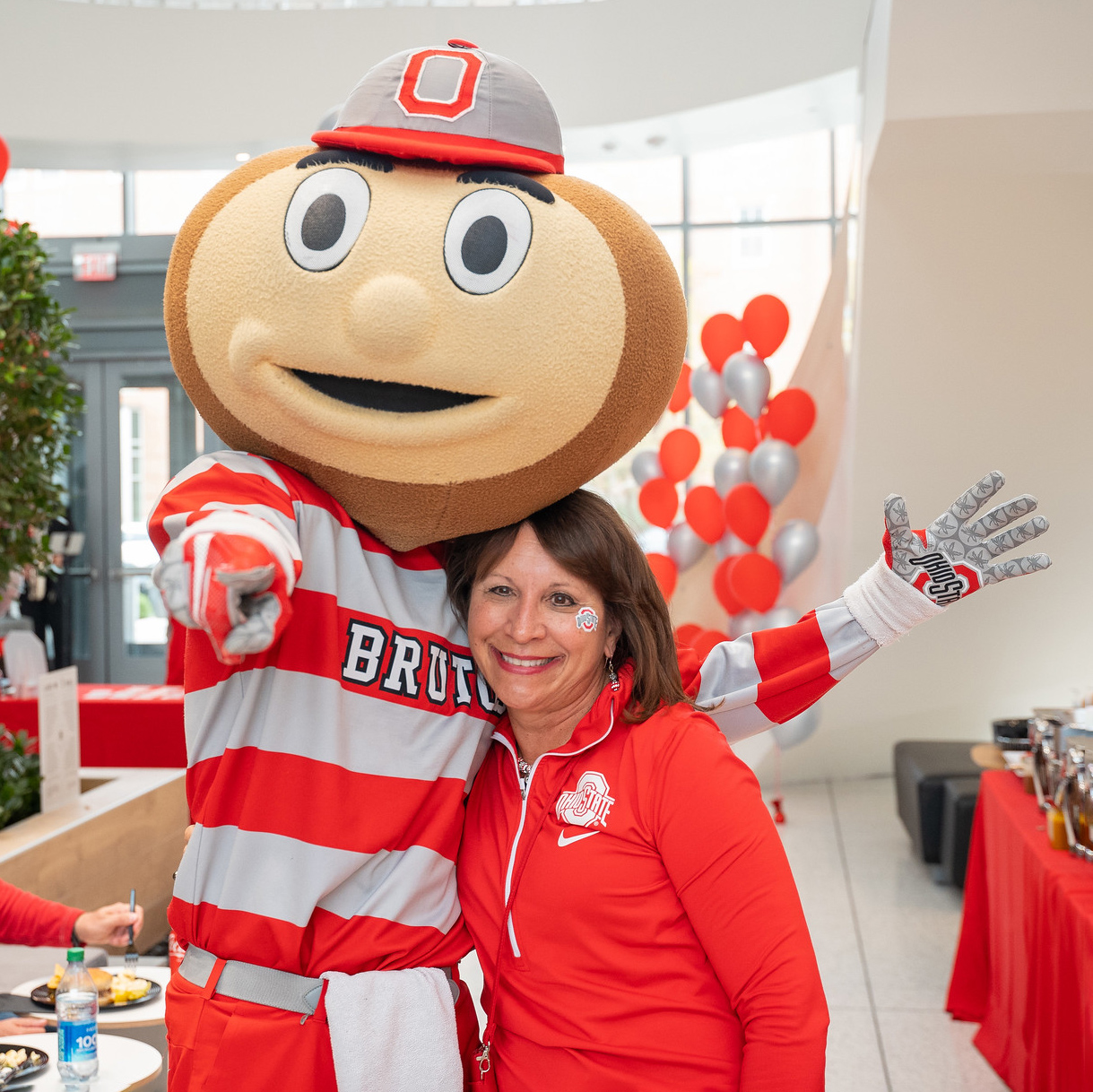 Bern Melnyk poses with Brutus at Homecoming