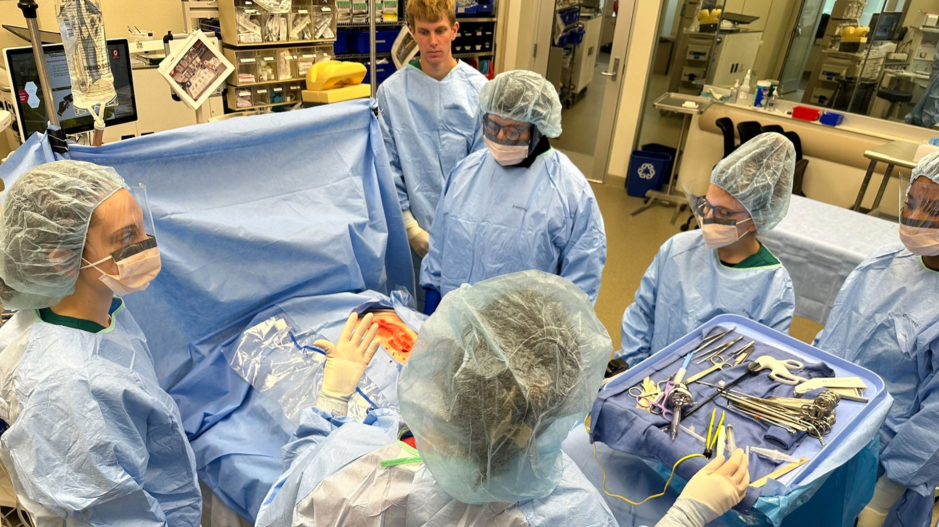 students learning in the operating room
