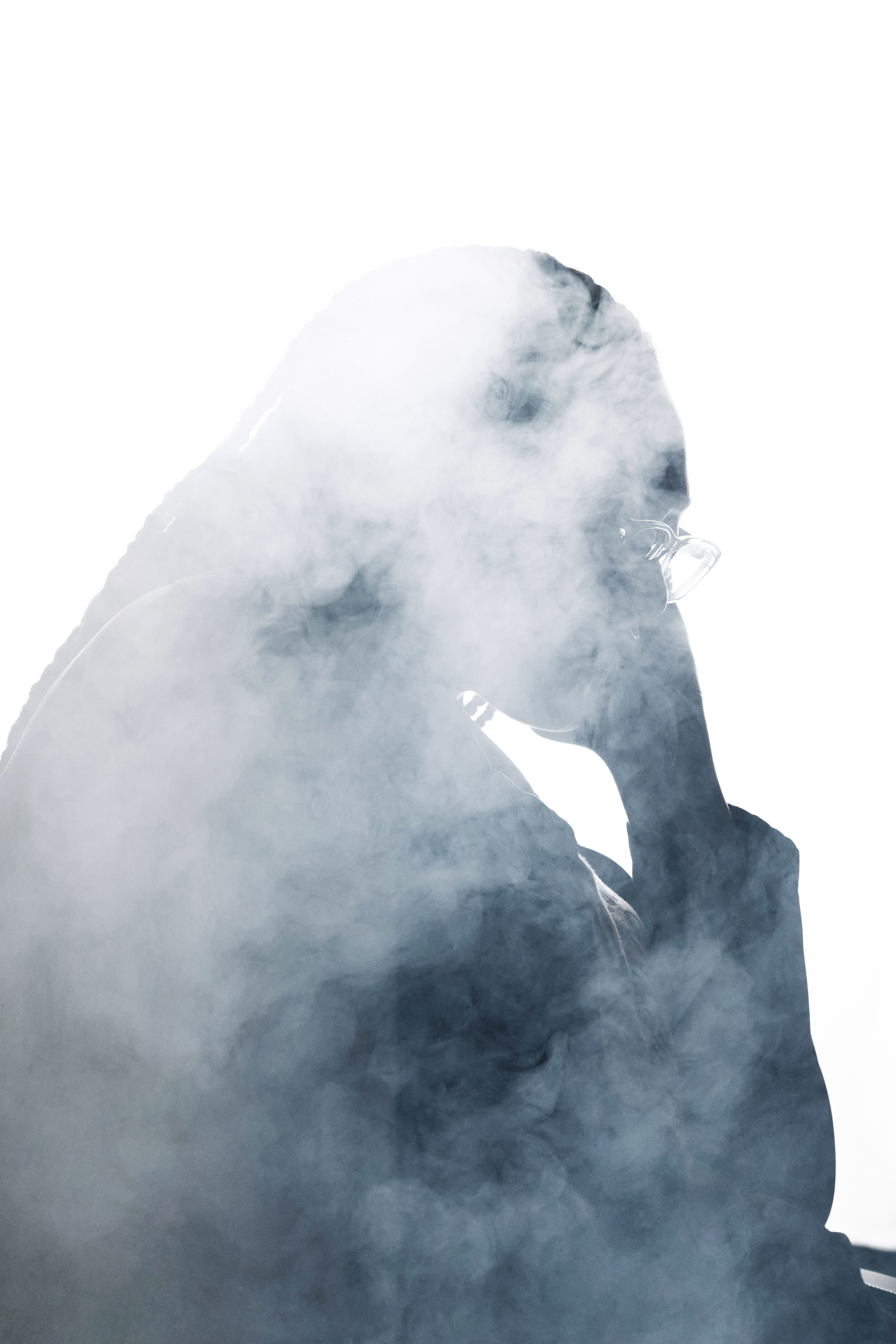 smoky silhouette of sad woman