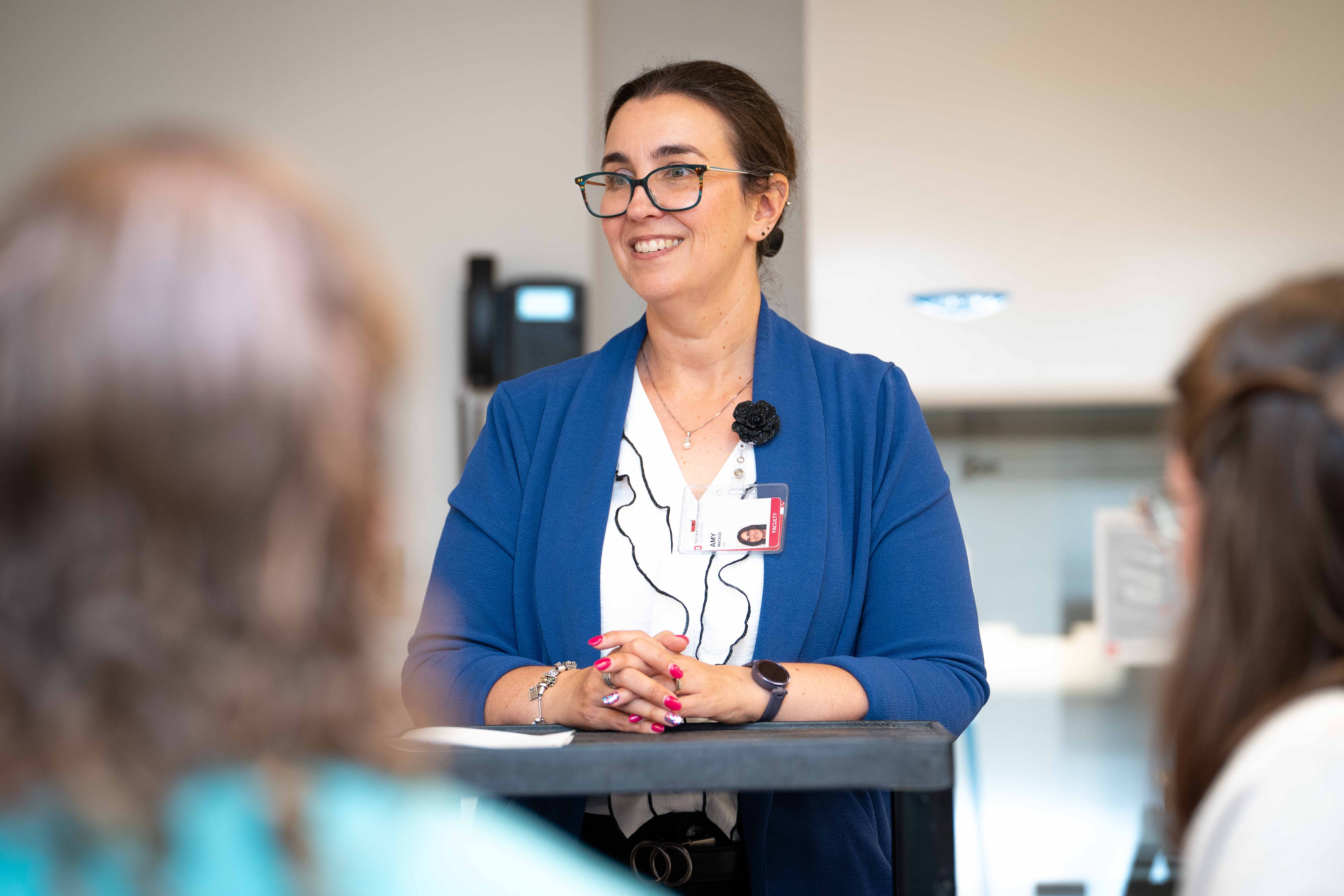 Associate Clinical Professor Amy Mackos helping to teach BSI attendees.