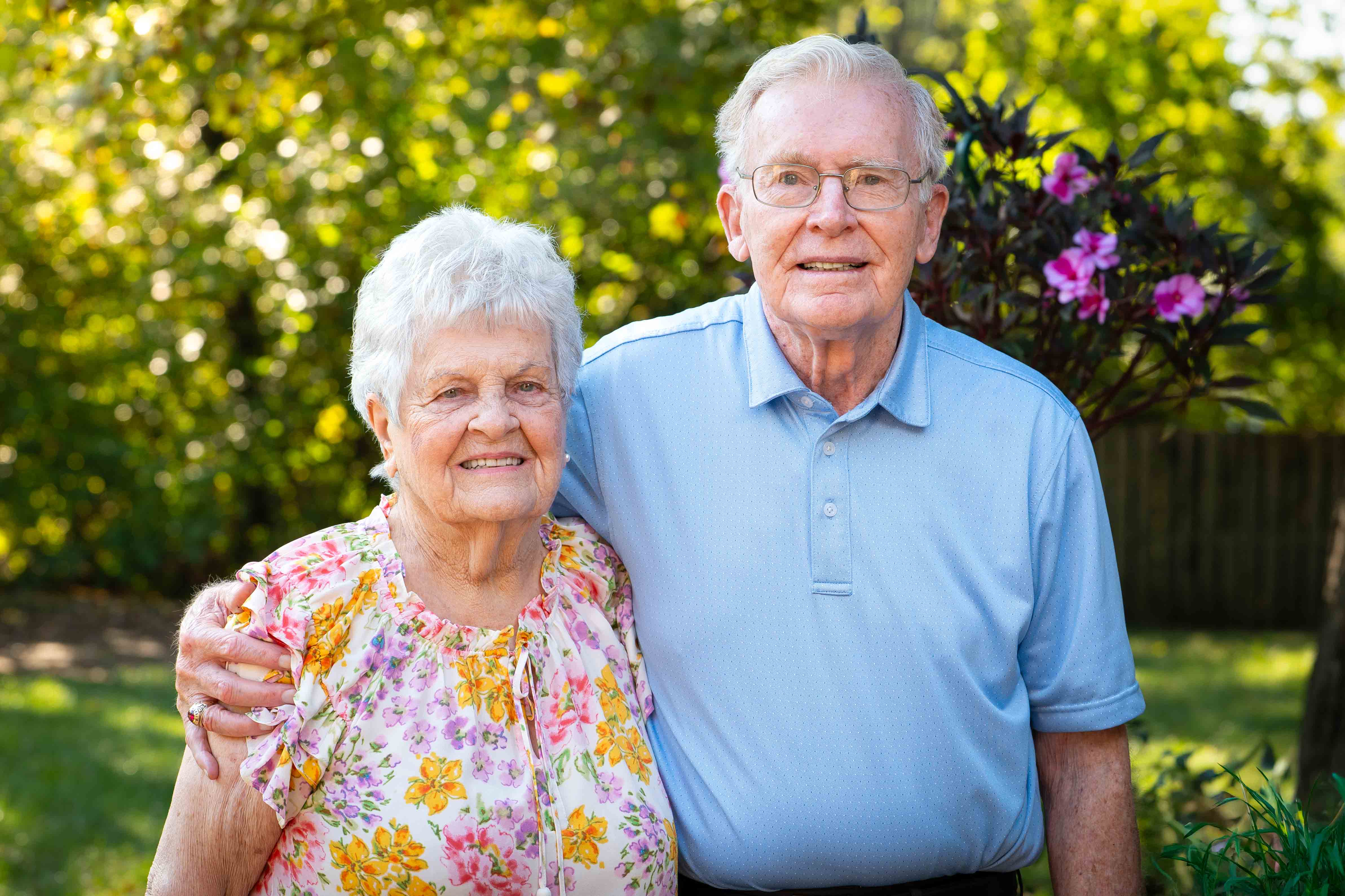 Carol and Roger McClure together in their backyard