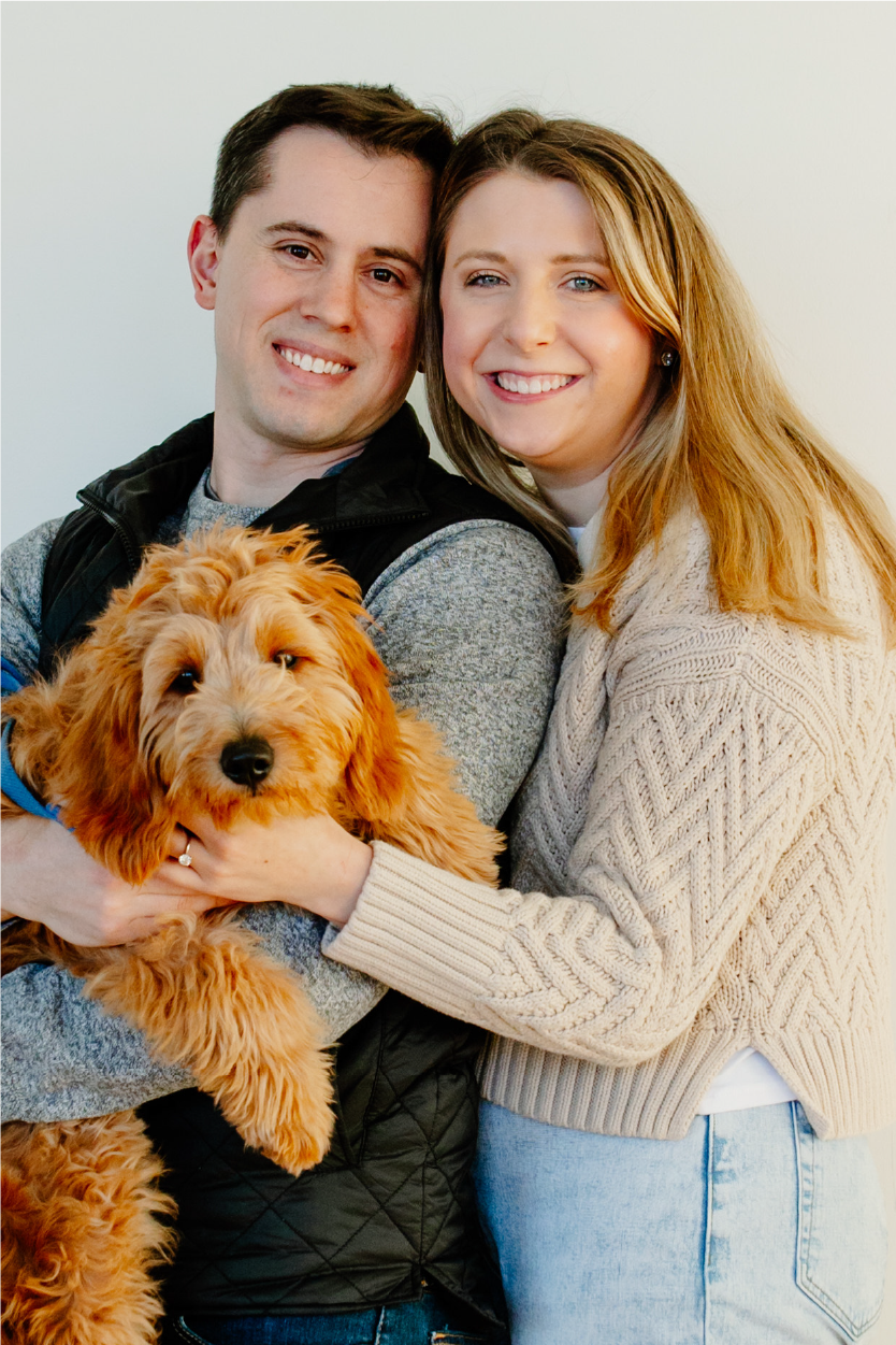 Melanie claver with her husband and dog