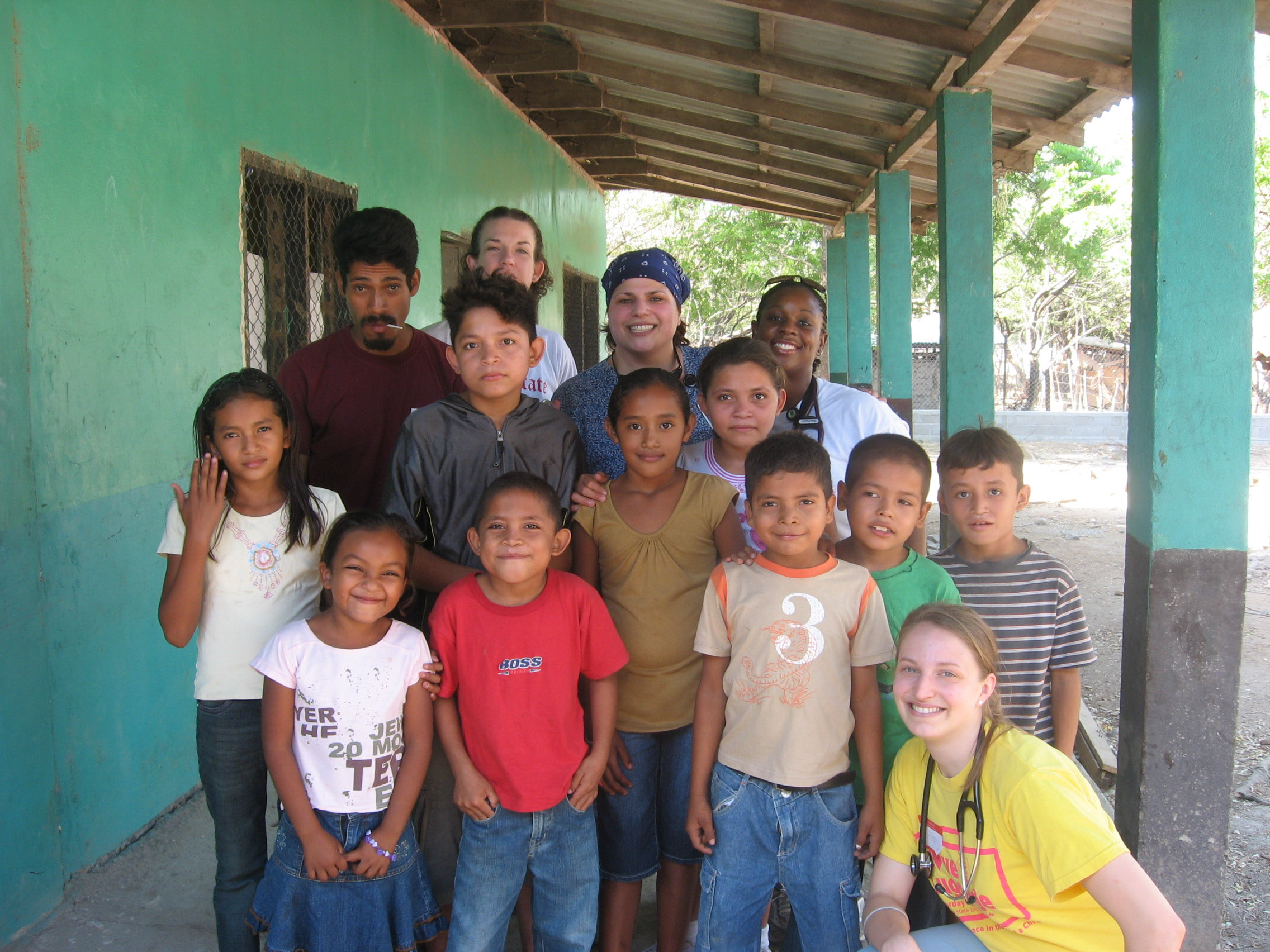 A group of children in Honduras with OSU students
