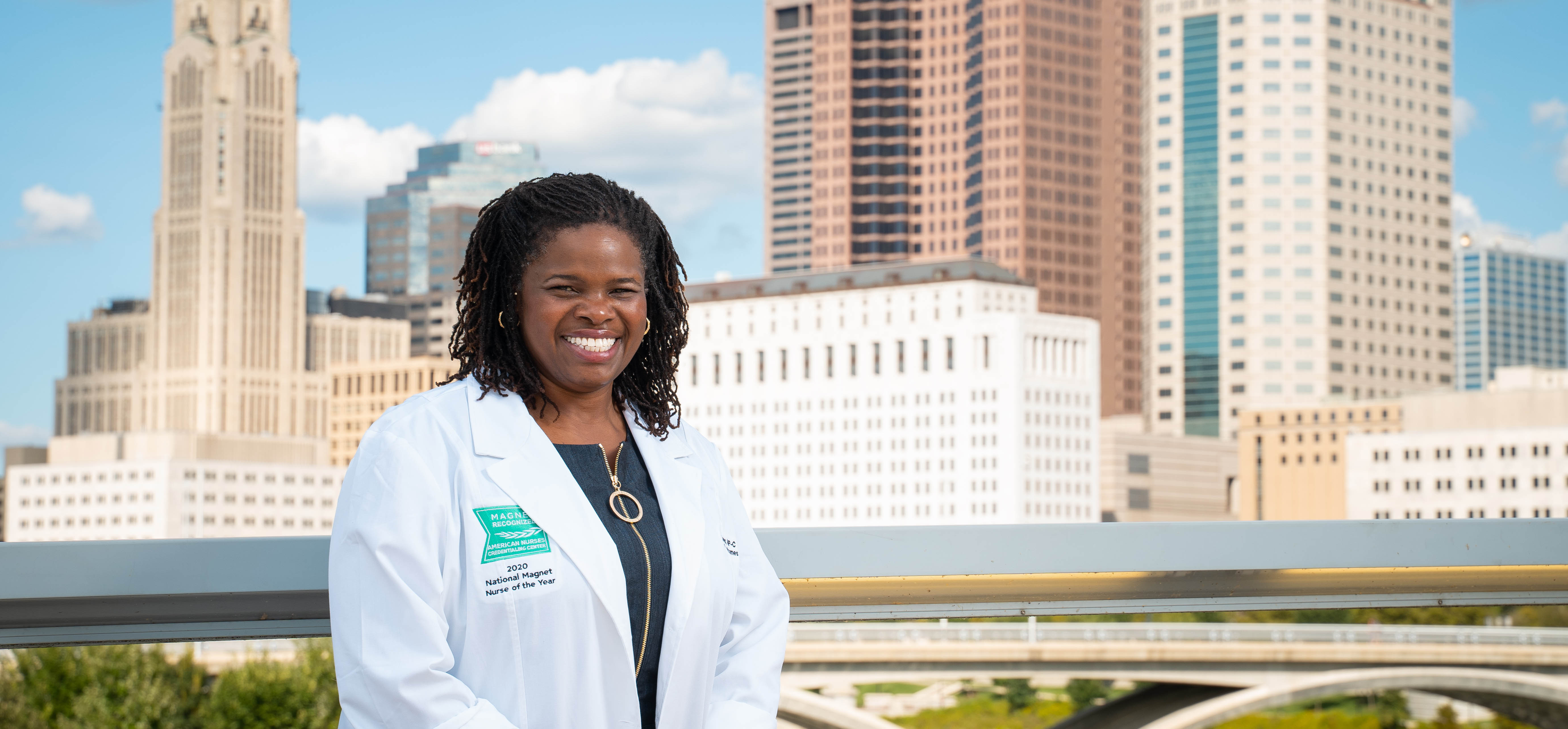 Denise Williams wearing her Magnet Nurse of the Year lab coat