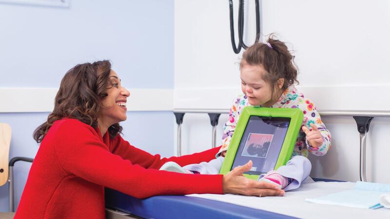 nurse practitioner treats an adolescent patient