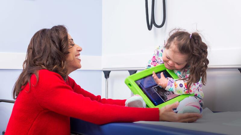 Stephanie Hosley with a child