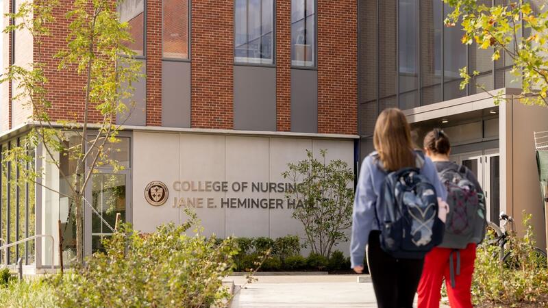 students walking in front of Heminger Hall