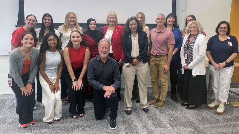 Former South Carolina governor David Beasley with a group of current nursing students, several nursing faculty, and nursing leadership