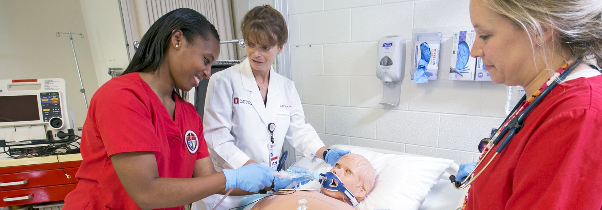 nursing students with instructor