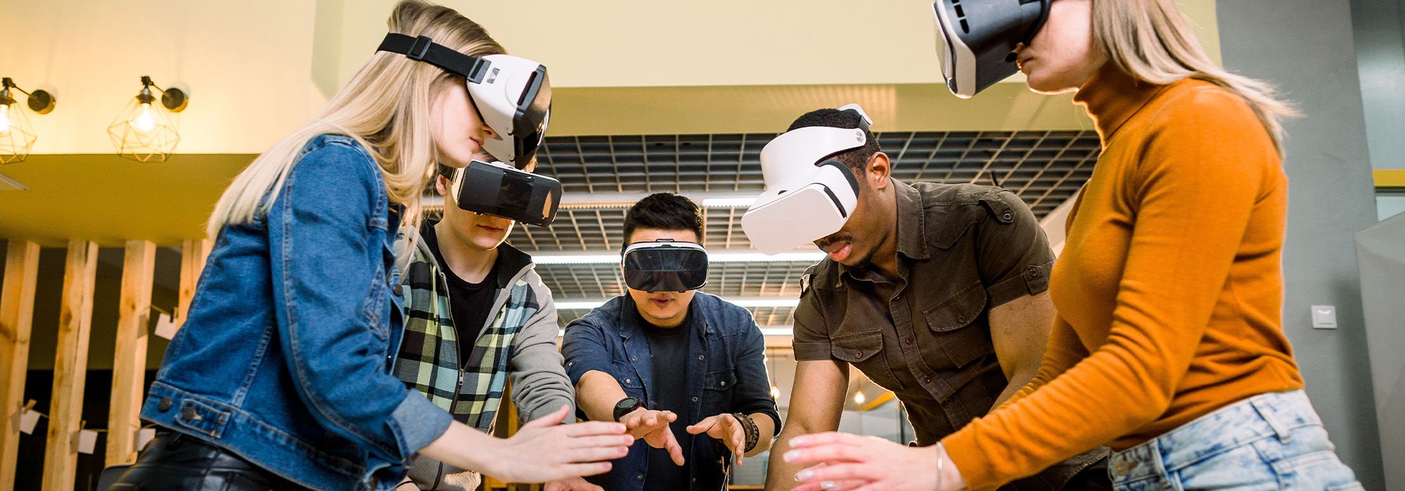 young adults wearing virtual reality headsets