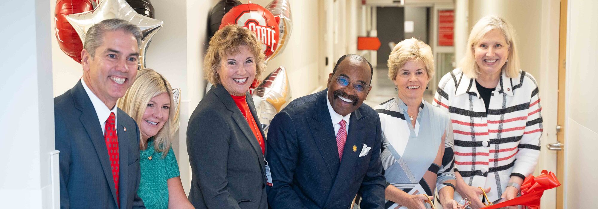 At the official ribbon cutting ceremony: Jay Anderson, Chief Operating Officer of The Ohio State University Wexner Medical Center; Senator Stephanie Kunze, Candy Rinehart, Senator Hearcel Craig, Community Board President Linda Mauger, Dean Karen Rose.