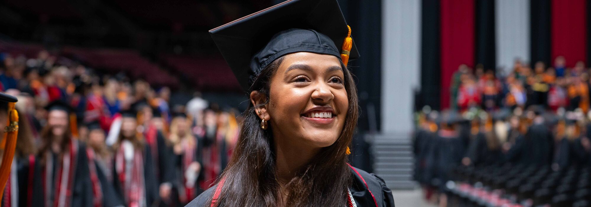 Smiling college of nursing graduate