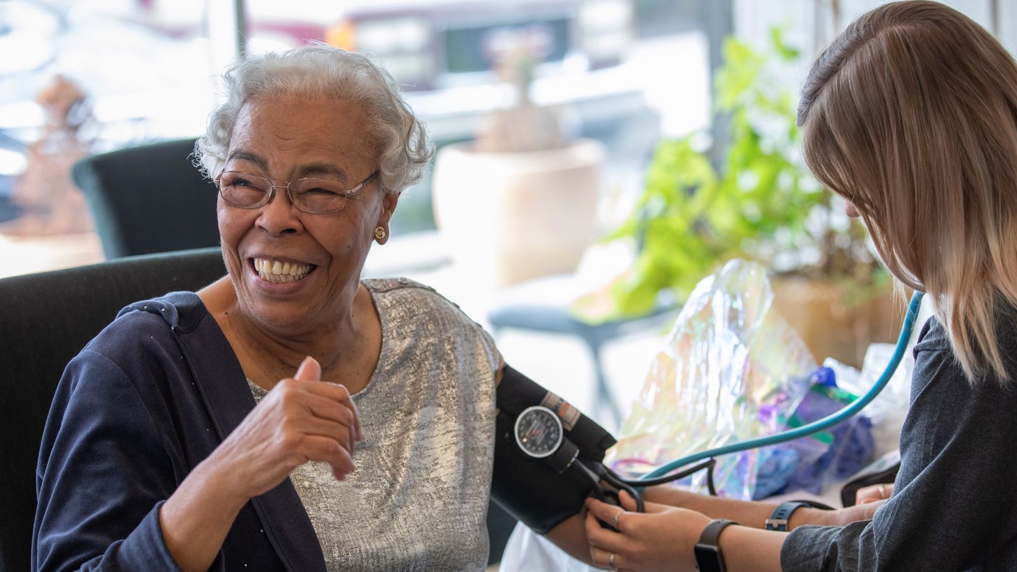 lady getting her blood pressure checked