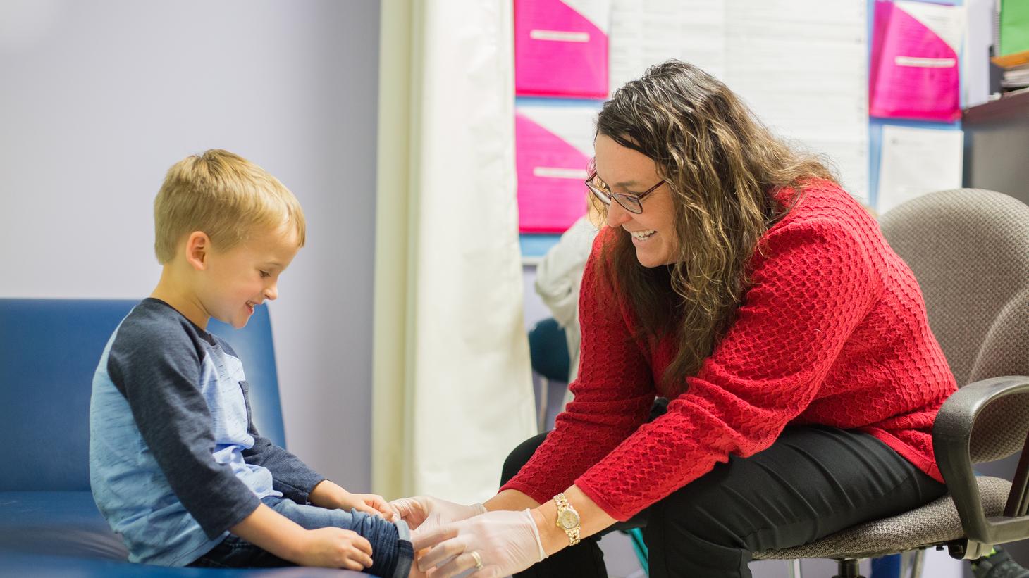 school nursing with young boy