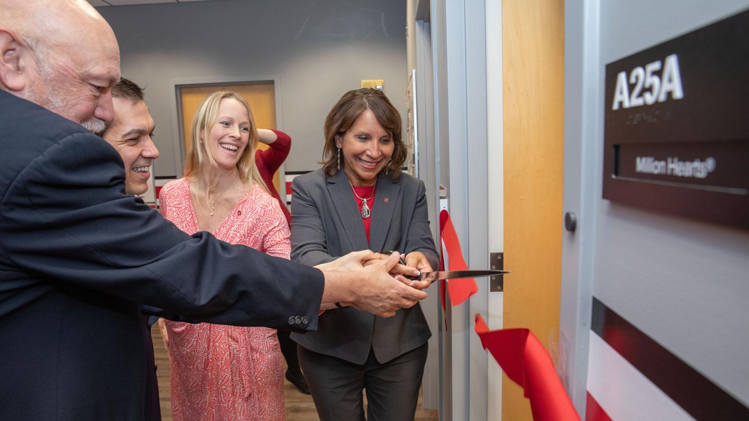 ribbon cutting at Million Hearts clinic launch event