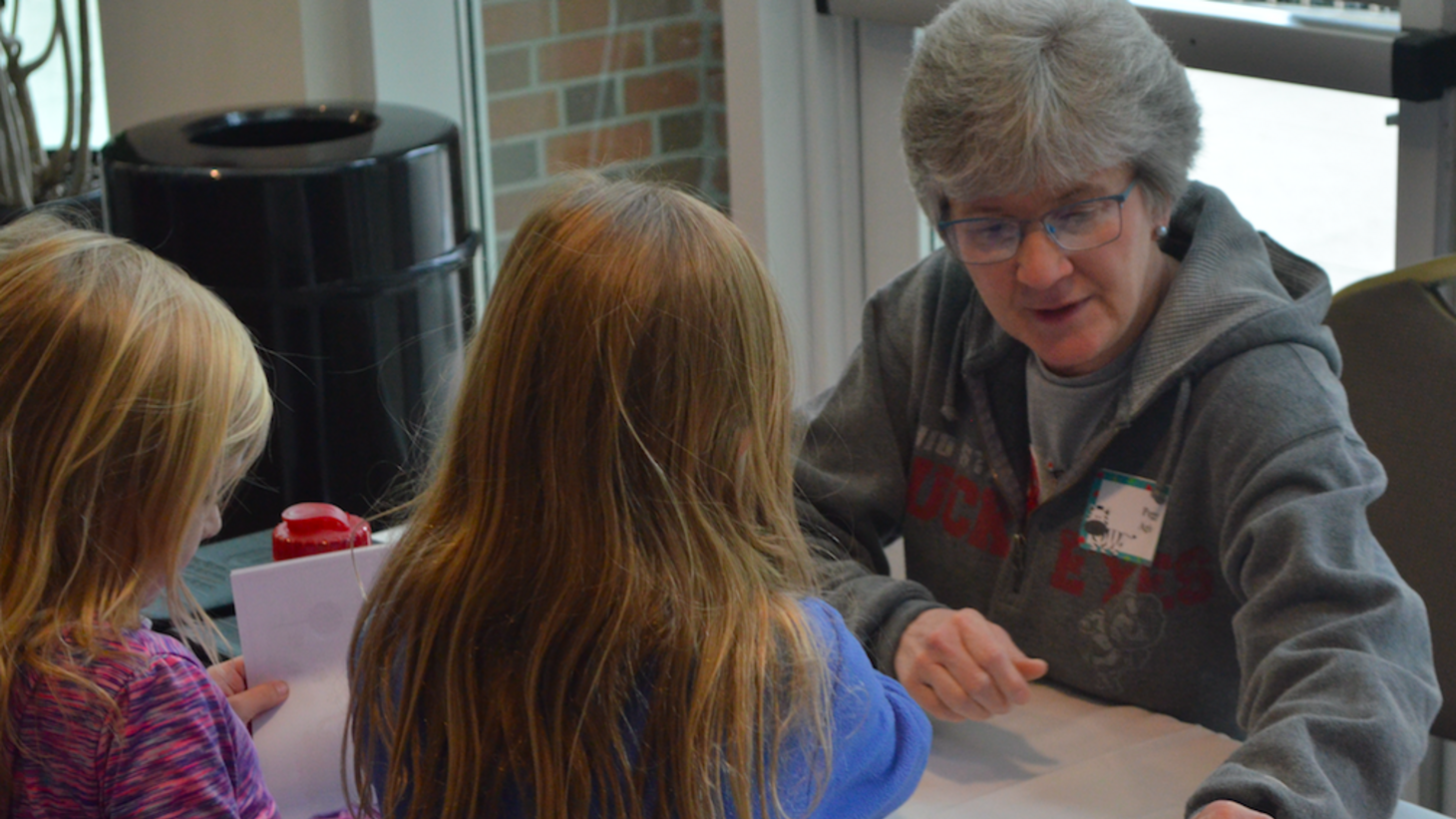 woman volunteering at family fun day