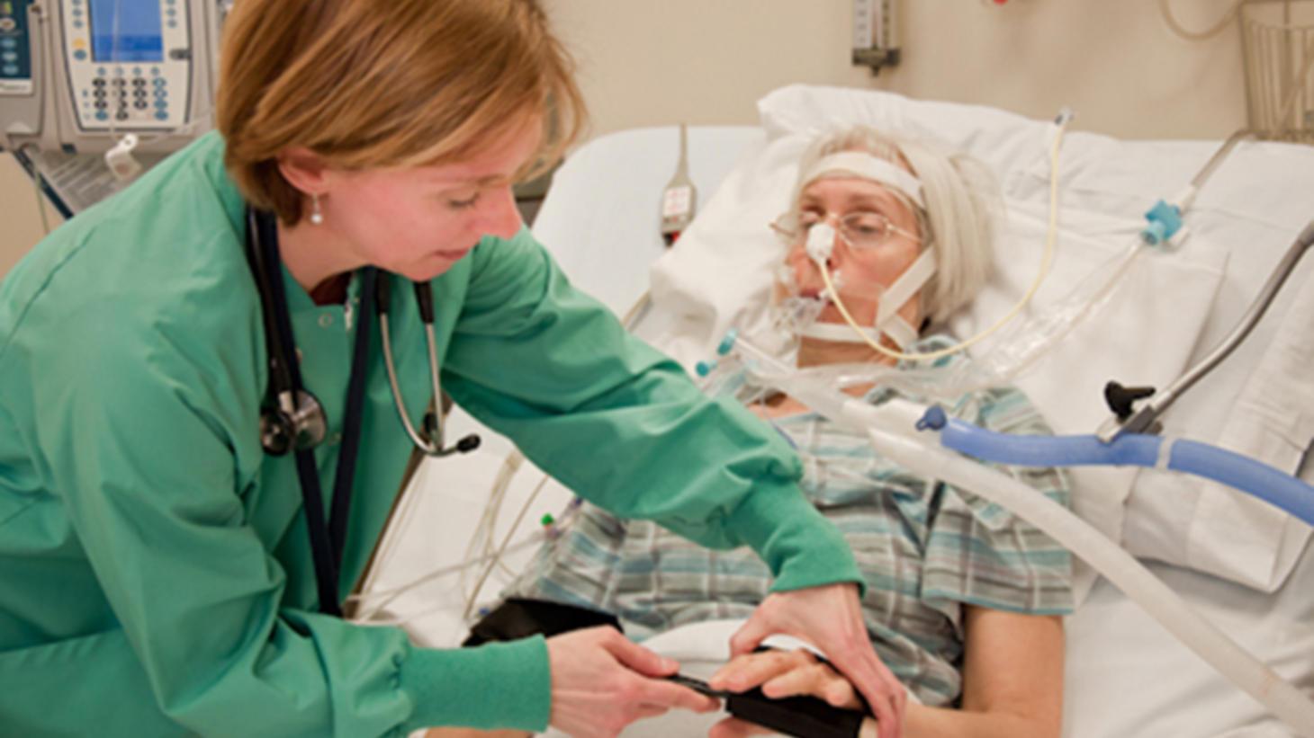 Nurse working with a patient