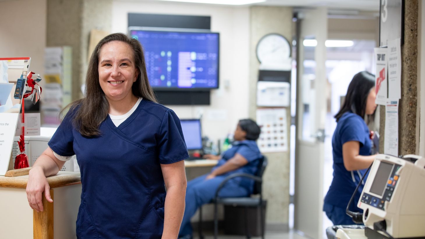 Preceptor, Maria Winner, posing at nurses station