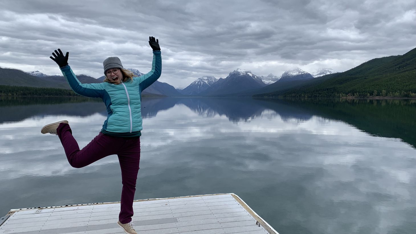 Kate Best posing in front of a lake