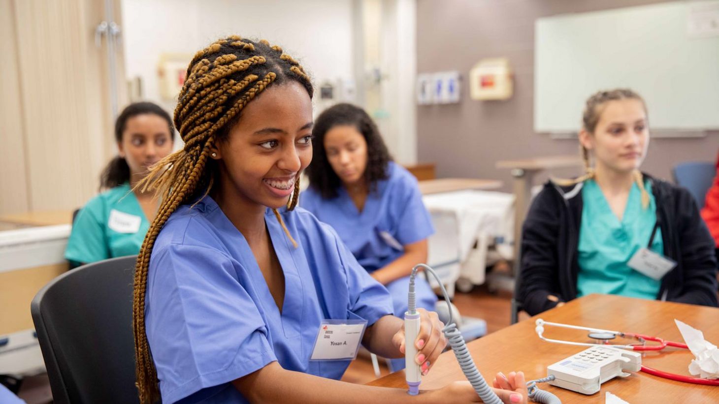 participant of summer institute tests medical equipment