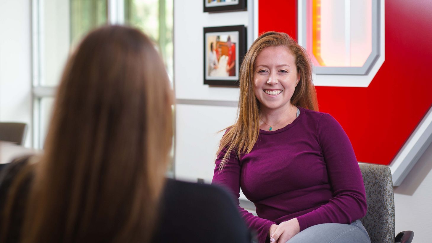 Student smiling and talking