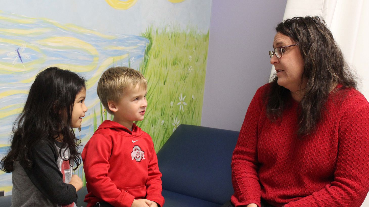 school nurse talking to children