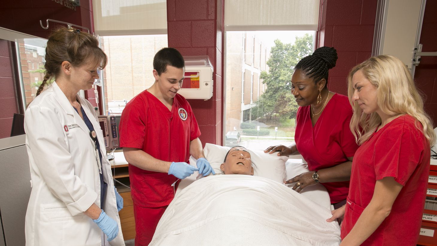 students practicing patient care