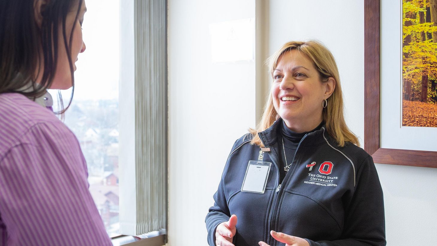 nurse talking with patient