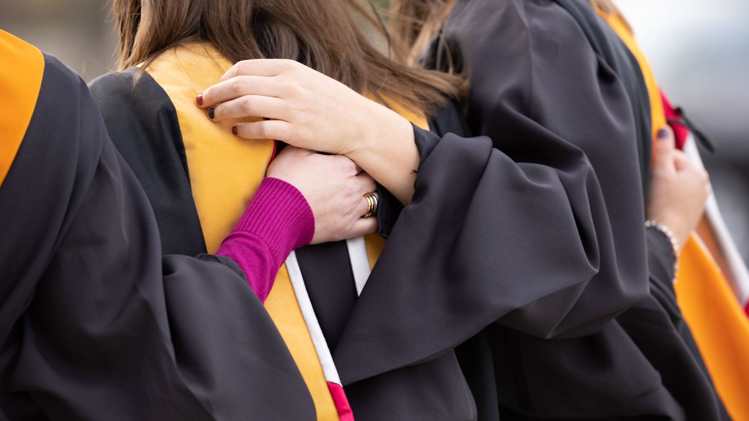 Holding hands during convocation 