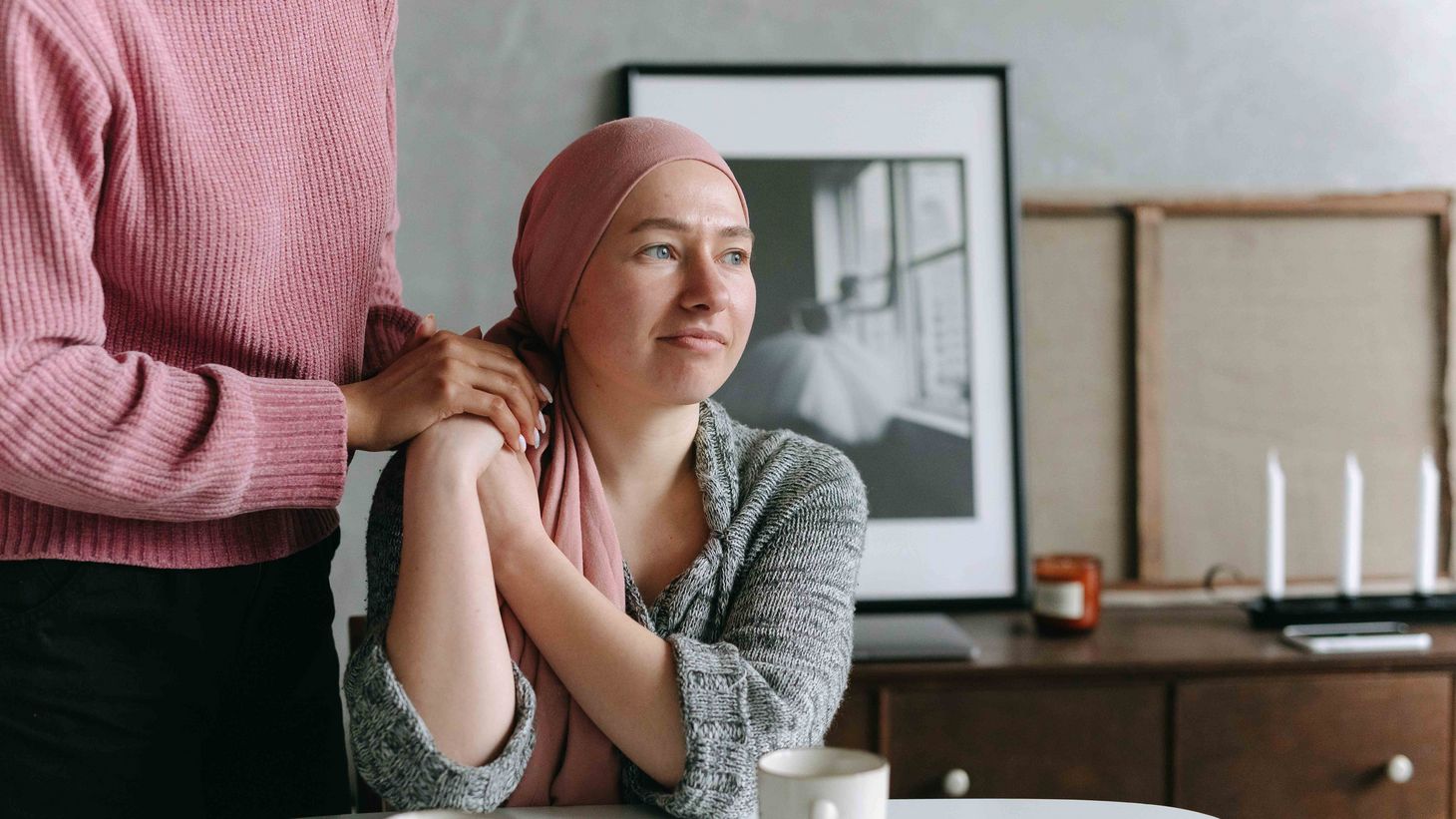 Patient receiving comfort from unknown person