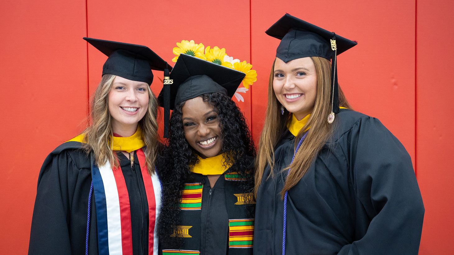 students pose together at Convocation