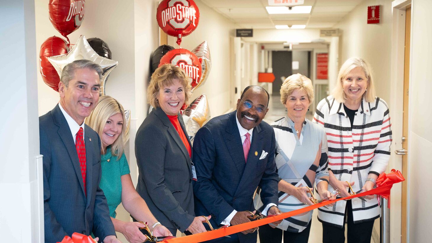 At the official ribbon cutting ceremony: Jay Anderson, Chief Operating Officer of The Ohio State University Wexner Medical Center; Senator Stephanie Kunze, Candy Rinehart, Senator Hearcel Craig, Community Board President Linda Mauger, Dean Karen Rose.