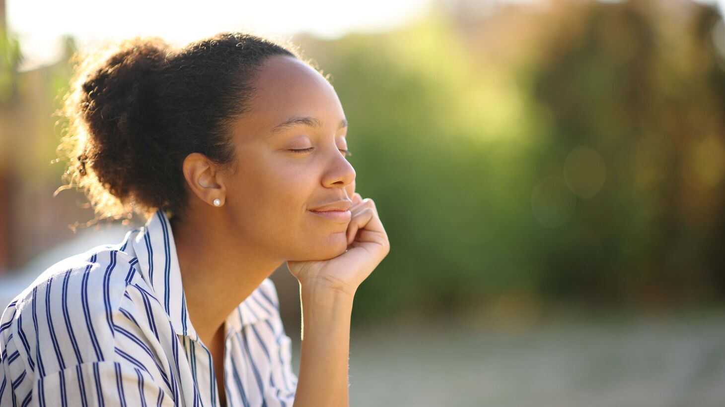 relaxed woman resting in a park