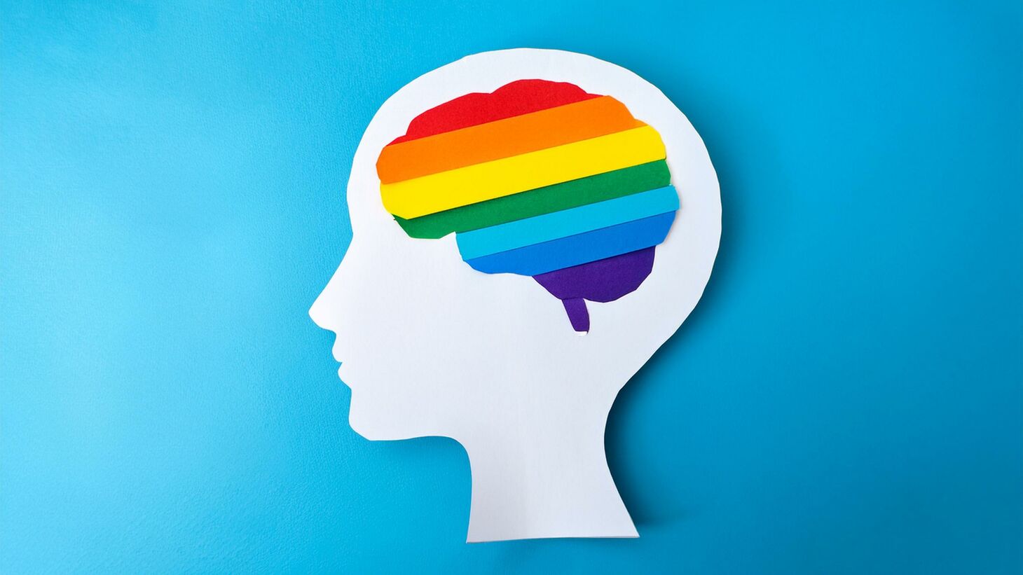 top view flat Paper Cut Craft of human rainbow brain on pink background