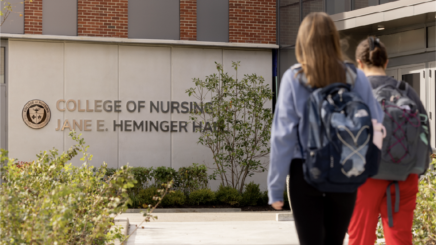 Students walking towards Jane E. Heminger Hall