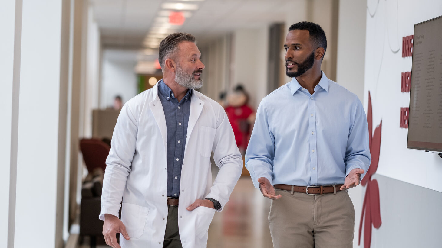 two healthcare professionals talking