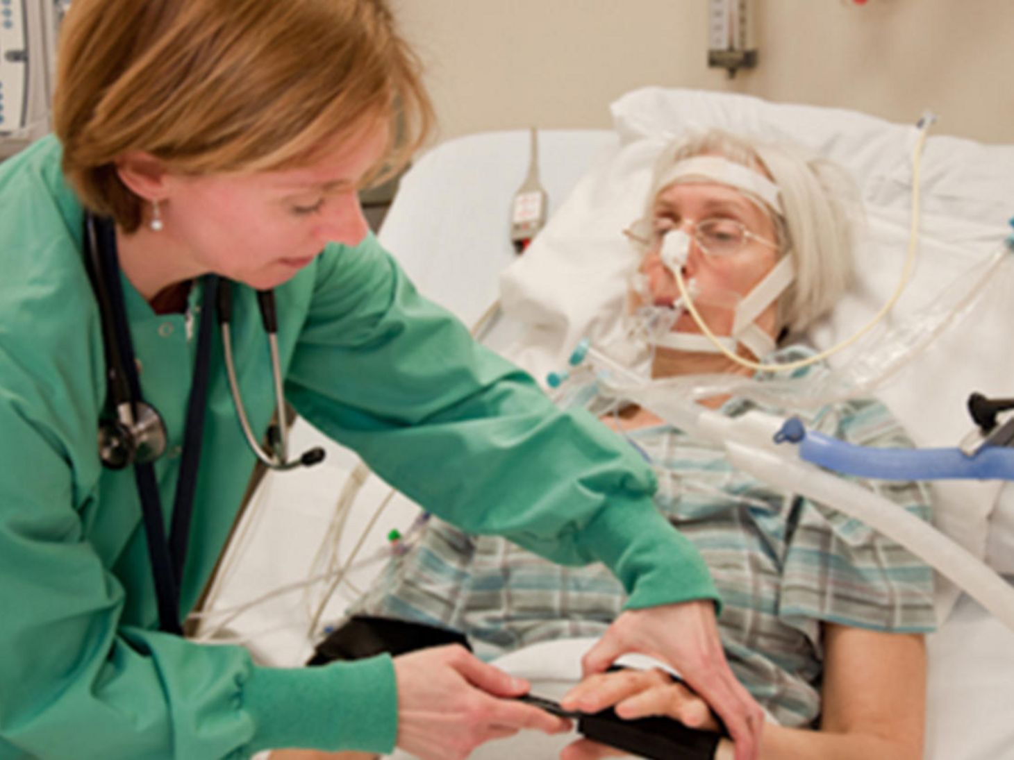 Nurse working with a patient