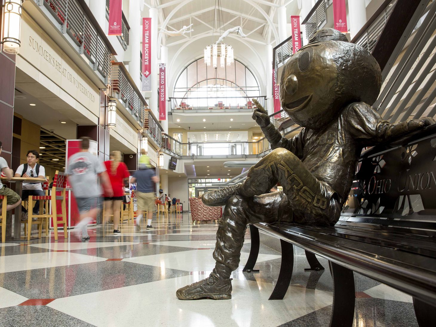 statue of Brutus sitting on a bench in the Ohio Union
