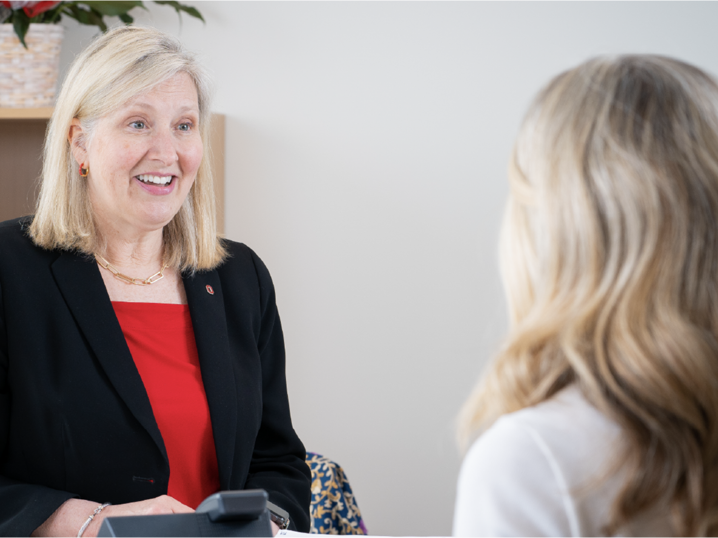 Karen Rose talking to a woman
