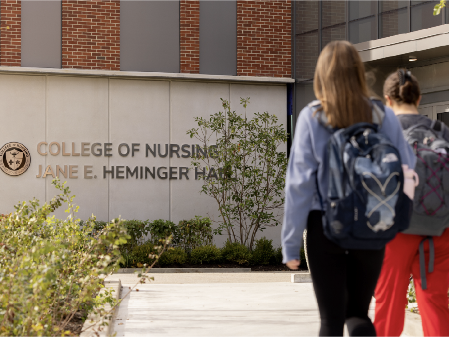 Students walking towards Jane E. Heminger Hall