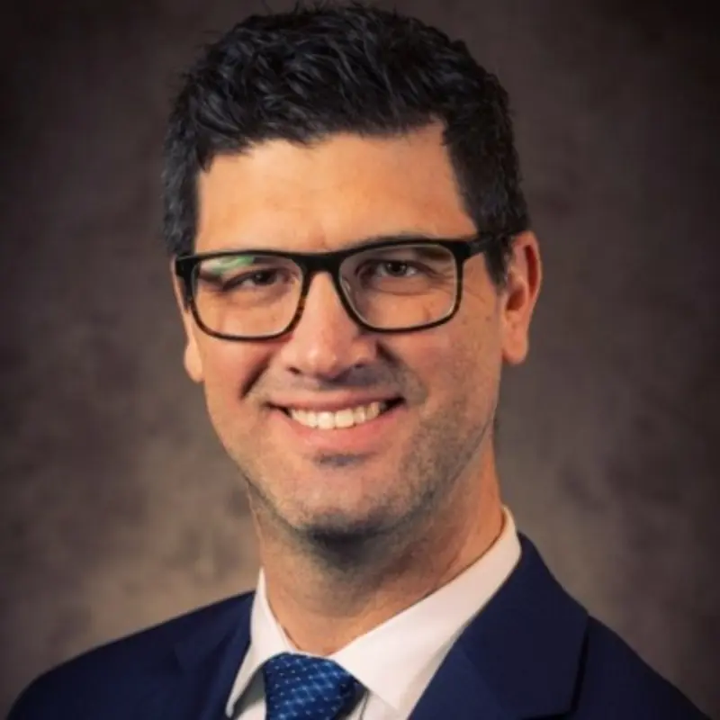 Nathan Jorgensen wearing suit and tie