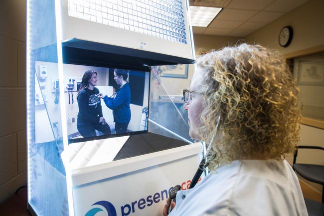 Nurse Practitioner using Telehealth equipment