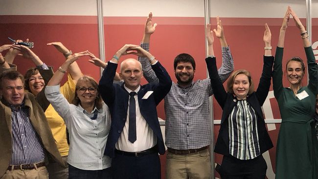 visiting scholars forming the O-H-I-O