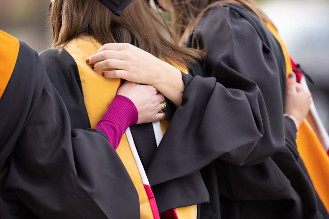 Holding hands during convocation 