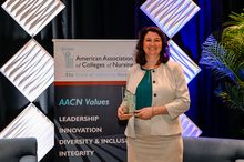 Marliese Nist poses with award