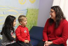 school nurse talking to children