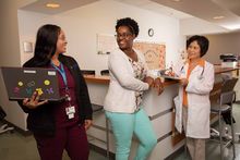 nurses collaborating at nurses station