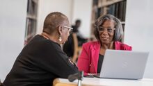 Delores Richardson works with Joyce Calamese at the Columbus Metropolitan Library to help manage her health care priorities