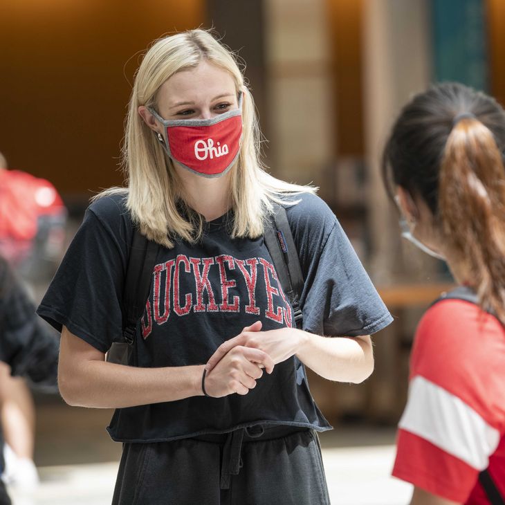 students with mask on campus